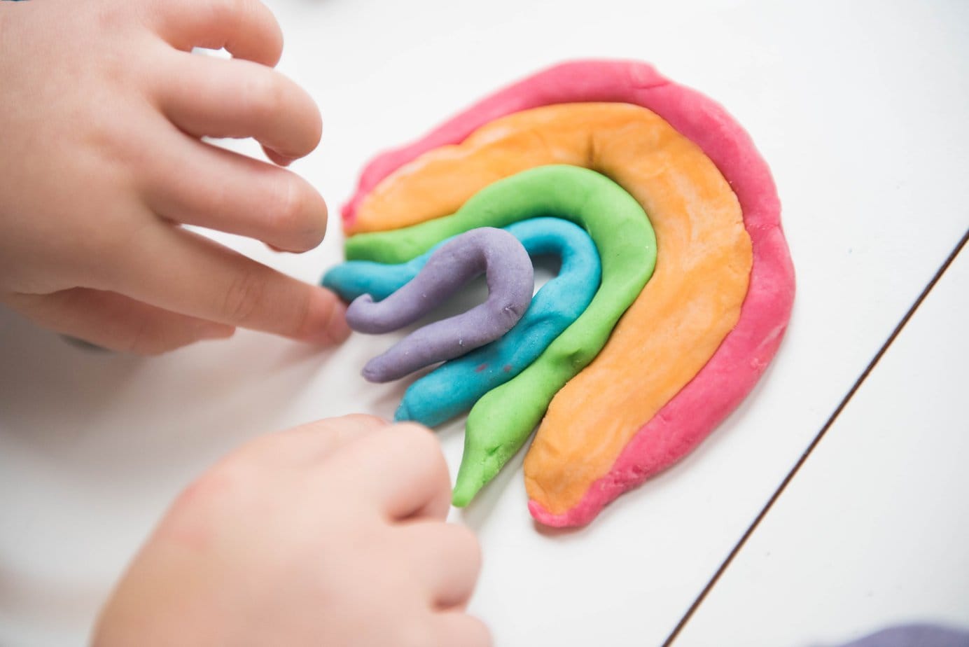 What are the benefits of playing with plasticine?